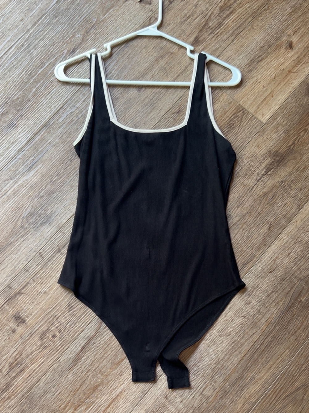 Black One-Piece Bodysuit with Cream Trim